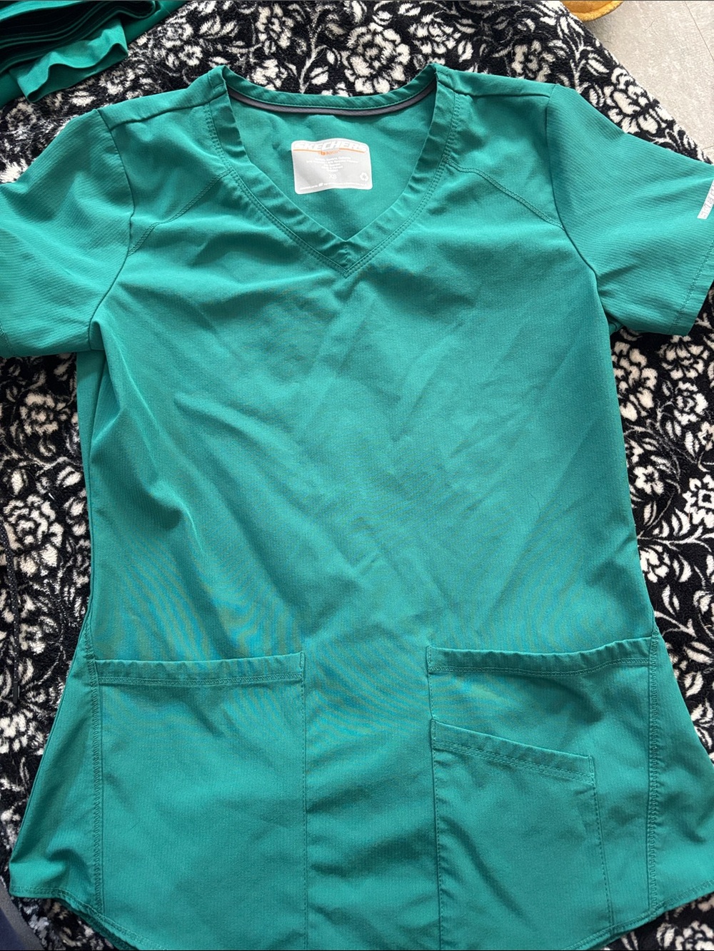 Skechers Women's V-Neck Short Sleeve Top in Teal Green